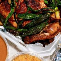 Whole Grilled Chicken With Sides · Chicken marinated in our signature recipe, grilled on a charcoal grill. Includes two 16oz si...
