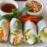 Thai Salad Rolls (2) · Rice paper wrapped around lettuce, rice noodles, sprouts, tofu, veggies, and served with pea...