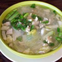 Kang Jeud (Thai Chicken Vegetable) · Homemade broth with fresh Napa cabbage, green onions, Clear thread noodles, and ground chick...