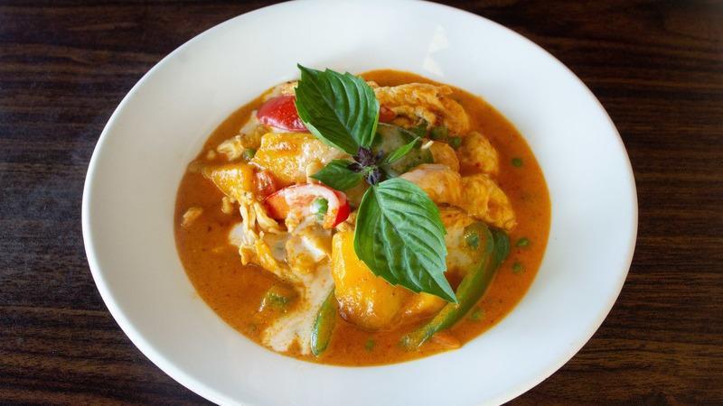 Mango Curry (Seasonnal Price) · Mild. Choice of protein with mango, bell peppers, basil leaves, peas and carrots in red curry.