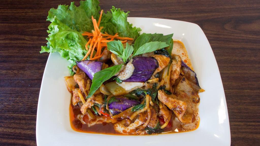 Pad Phet · Mild. Choice of protein with chili paste, egg plant, bamboo shoots, onions, bell peppers, sweet basil leaves.