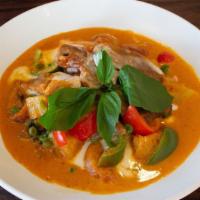 Duck Curry · Roasted duck with bell peppers, tomato and pine apple in red curry sauce.