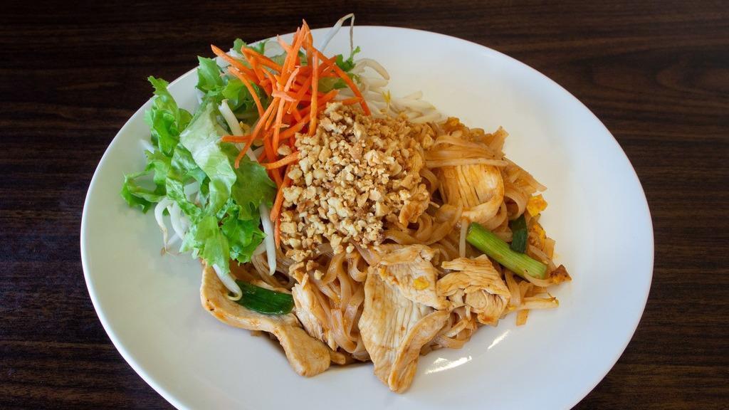 Pad Thai · Mild. The most popular Thai dish! Choice of protein with medium sized rice noodles, egg, green onion, and bean sprouts, topped with ground peanut.