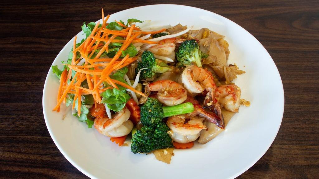 Pad Se Ew · Mild. Wide rice noodles glazed with egg, broccoli, carrots, and Thai sweet soy sauce.