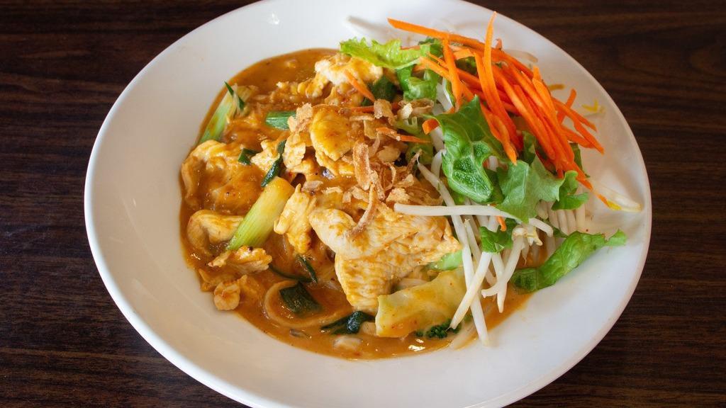 Mee Ka Ti (Evil Jungle Noodles) · Mild. Steamed rice noodles, mixed vegetable and topped with Thai specialty curry and your choice of protein.