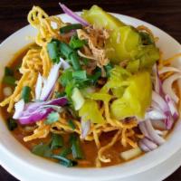 Kao Soi (Northern Style Thai Noodle) · Mild. Choice of protein with egg noodle, green onion, pickled lettuce in Kao Soi curry soup,...