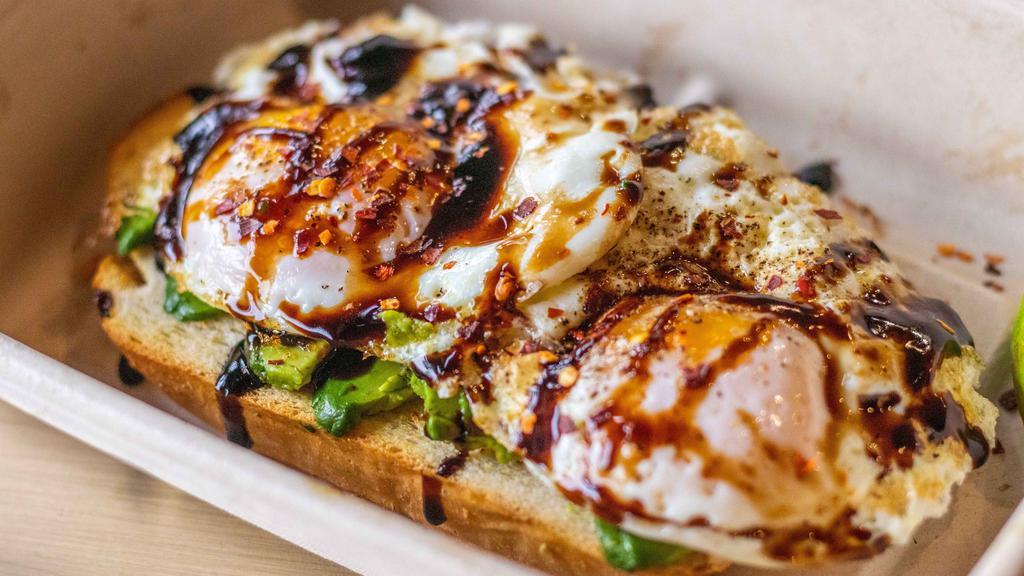 Classic Avocado · Hass avocado, two sunny side up eggs, red pepper, balsamic glaze.