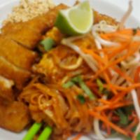 Padthai With Crispy Chicken. · Rice noodles stir-fried with egg, chive and bean sprout with traditional tamarind sauce topp...