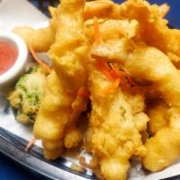 Shrimp Tempura (6) · Crispy fried shrimp mixed with vegetables tempura and sweet chili sauce.