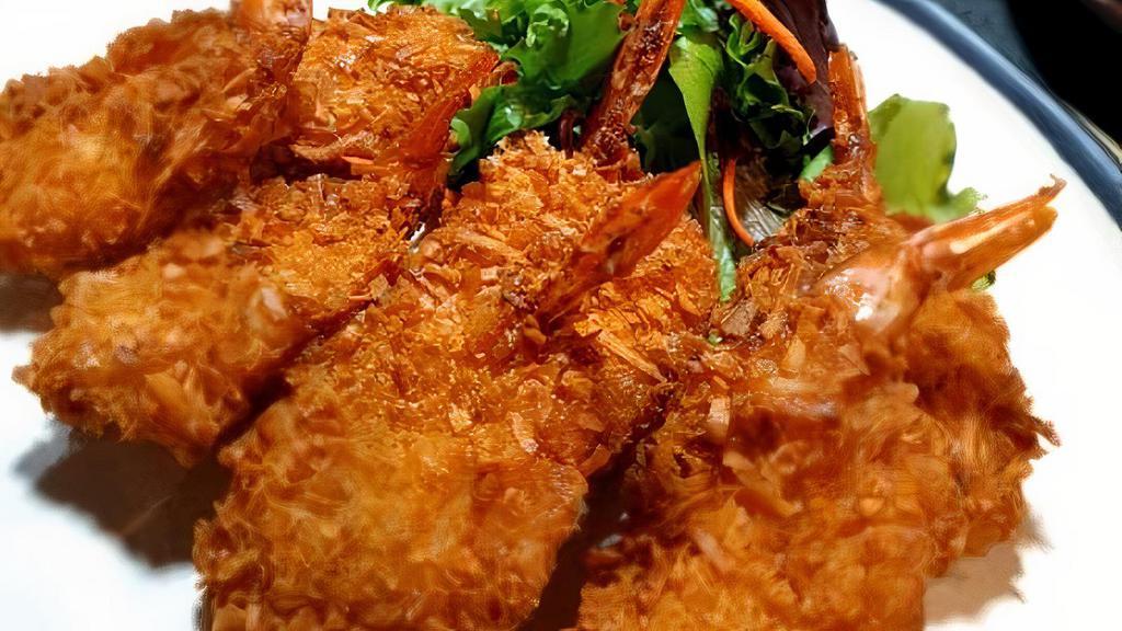 Coconut Fried Shrimp (7) · Deep fried breaded coconut shrimp served with sweet and sour sauce.