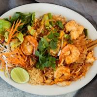 Pad Thai · Rice noodles stir fried with egg, chives and bean sprout with traditional tamarind sauce top...