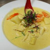 Yellow Curry · Yellow curry paste cooked with potato, zucchini and carrot in coconut milk. Add beef, pork, ...