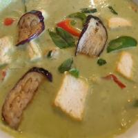 Green Curry · Green curry paste cooked with bamboo shoot, eggplant, bokchoi, bell pepper and basil in coco...