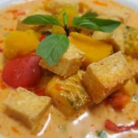 Pumpkin Curry  · Pumpkin cooked in red curry with bell pepper, peas and basil in coconut milk. Add beef, pork...