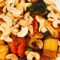 Cashew Nut Wok · Stir fried cashew nut, broccoli, carrots, baby corn, green & white onions, roast chili cooke...