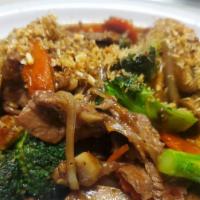 Garlic And Black Pepper · Stir fried garlic and black pepper with broccoli, carrots, mushroom, green & white onions. A...