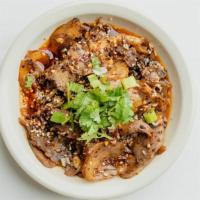 Fu Qi Fei Pian · Cold cuts of beef tripe, beef tendon, beef tongue, and beef belly marinated in Szechuan chil...