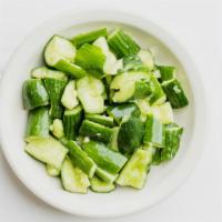 Cucumber Salad · Fresh cucumbers seasoned with garlic, salt, pepper and sesame oil.