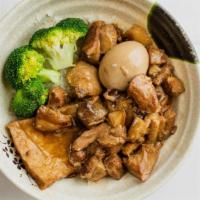 Lu Rou Fan · Slow cooked braised pork belly with soy sauce egg and tofu over rice.