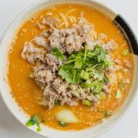 Lamb Noodle Soup · Fresh lamb slices in our chili sesame lamb broth with handmade egg noodles. Topped off with ...