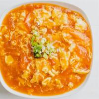 Tomato Egg Noodle · Handmade egg noodles with a stir fry savory and sweet tomato egg sauce.