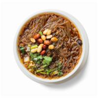 Hot And Sour Noodle Soup · spicy minced pork in hot and sour broth with potato noodles. Topped with scallions and cilan...