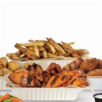 24 Pieces Family Pack · 24 crisp boneless or classic bone-in wings with up to three flavors, large hard cut fries or...