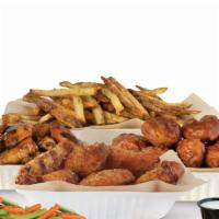40 Pieces Group Pack · 40 crisp boneless or classic bone-in wings with up to four flavors, large hard cut fries or ...