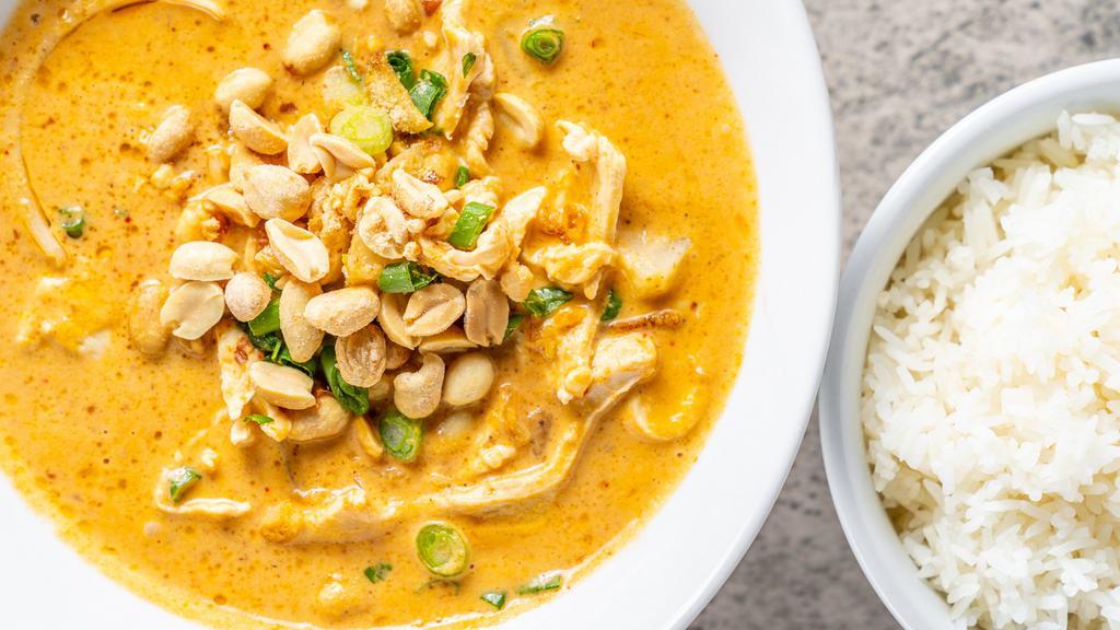 Mussaman Curry · Massaman curry cooked with coconut milk, potatoes, onions and topped with peanuts.
