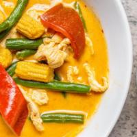 Panang Curry · Panang curry cooked with coconut milk, green beans, water chestnuts, baby corn and bell pepp...