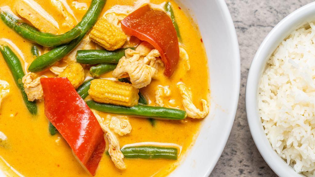 Panang Curry · Panang curry cooked with coconut milk, green beans, water chestnuts, baby corn and bell peppers.