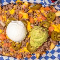 Loaded Fries Platter · Heaping portion of straight cut fries covered with nacho cheese, ground beef our own pico de...