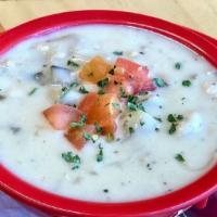 Seafood Chowder Cup · New England style with ono, mahi mahi, mushrooms, clams, onions and garlic.