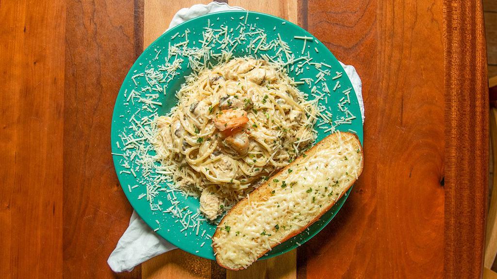Seafood Pasta. · Alfredo cream sauce with capers or marinara sauce with mahi mahi, ono, and shrimp. Slice of garlic bread. Every order made from scratch.