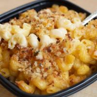 Mac And Cheese Single · (vegetarian) Served ready to heat–Guest favorite — cavatappi pasta and cheese sauce topped w...