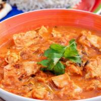 Tikka Masala · Roasted chicken pieces in thick curry sauce.