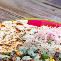Lamb Kebab Plate · Skewered lamb with rice, naan, lettuce and pickled onions