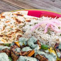 Chicken Kebab · Grilled skewered meat and vegetables.