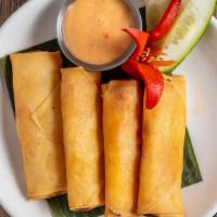 Crazy Crab Rolls · Imitation crab meat with cream cheese, scallion, wrapped in eggroll shell fried to a golden ...