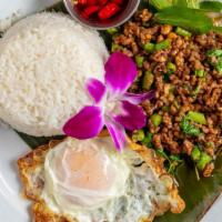 Krapow Kai Dao · Stir-fried minced meat with fresh chili, basil, green bean topped with fried egg.