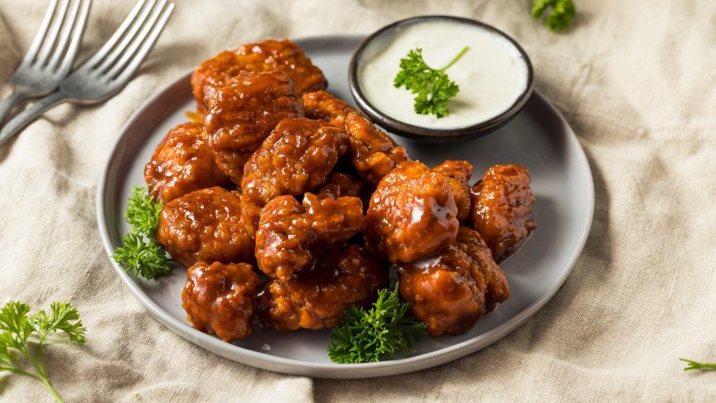 Bbq Boneless Wings · Boneless! Crispy chicken wings tossed in sweet BBQ sauce for flavor,  served with side of ranch or bleu cheese.
