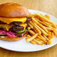 Double Patty Burger · 12oz of beef patty, double the amount of cheese, shredded iceberg lettuce, tomato,
house sau...