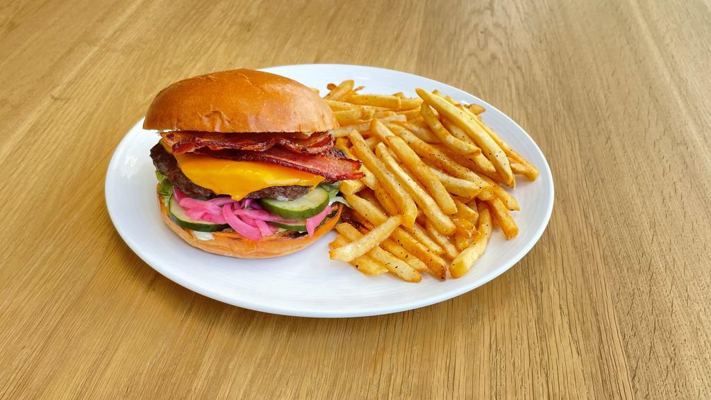 Bacon Beef Burger · 6oz of beef patty, bacon, your choice of cheese, shredded iceberg lettuce, tomato, house sauce,
pickled red onion, pickled cucumber on a brioche bun.
Comes with a side of fries and ketchup.