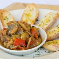 Caponata · Compote of eggplant, olive, onion, red pepper, with grilled crostini.