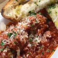 Meatballs With Bruschetta · Four meatballs in a hearty marinara with parmesan and grilled bruschetta.