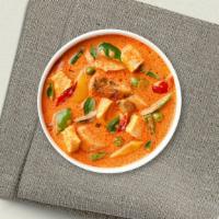 Red Between The Lines Curry · Red curry paste, bell pepper, basil, Thai eggplant and bamboo shoots.