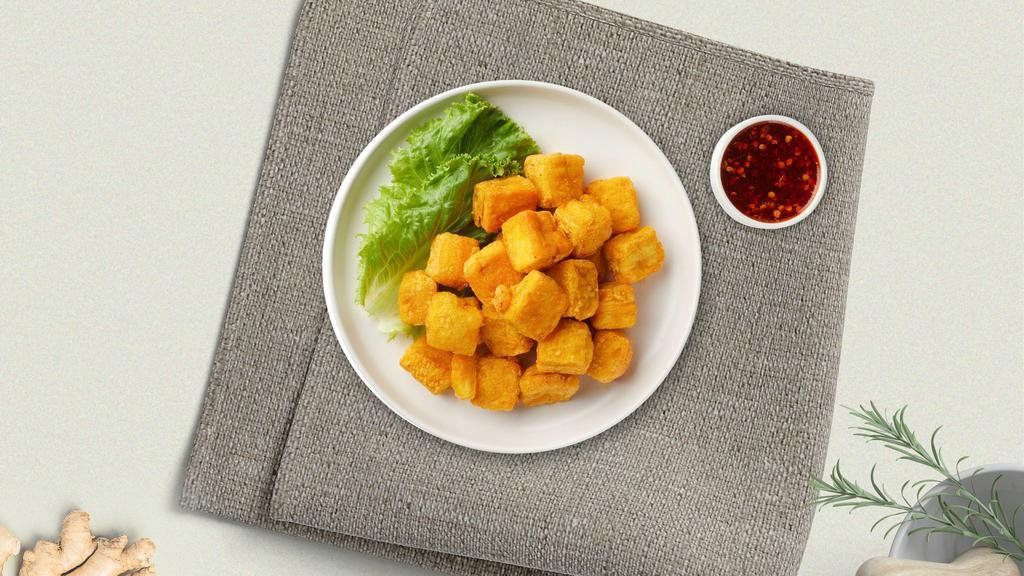 Terrific Tofu · Deep fried tofu served with sweet and sour and crushed peanut.