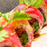 Tuna Lover Roll · Shrimp tempura, spicy tuna, asparagus, green onion, topped with tuna, lemon, cilantro and ra...
