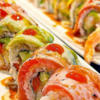 El Señorito Roll · Cucumber, avocado, crab, shrimp tempura, topped with salmon, crunchy, eel sauce and sriracha...