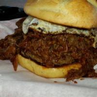 Chipotle Steak Burger · Topped with 1/2 lb chipotle-braised ribeye, grilled onions, provolone cheese, Cajun steak sa...